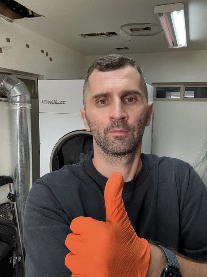 Servicing a Speed Queen commercial washer in San Diego