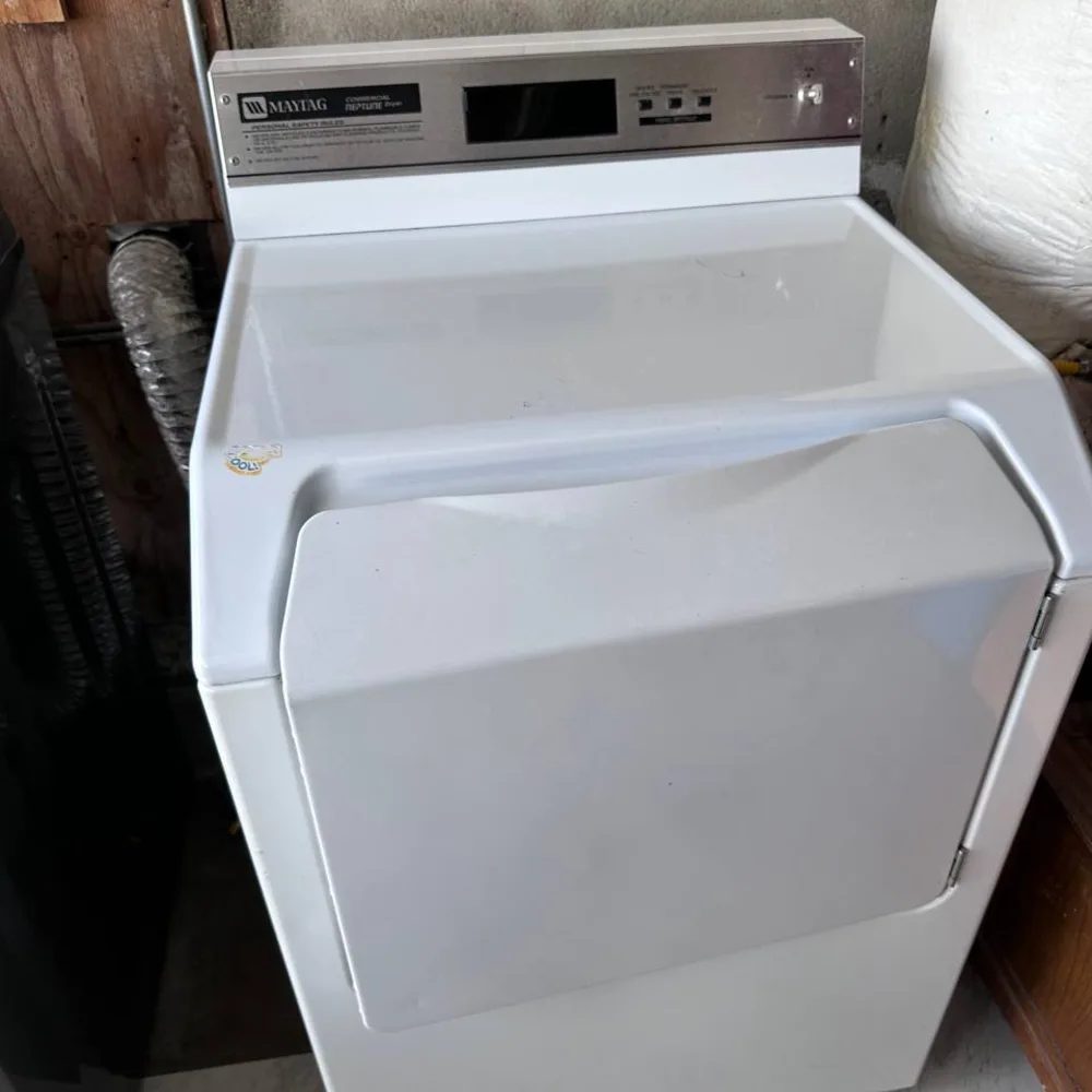 Clearing a clogged dryer exhaust vent — Refrigerator and Appliance Repair, San Diego