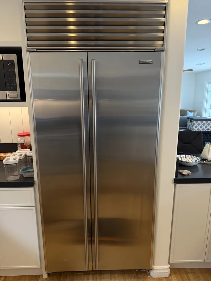 Built-in refrigerator repair in a Miramar kitchen