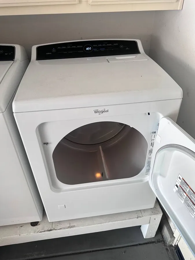 Dryer opened for internal repair in San Diego