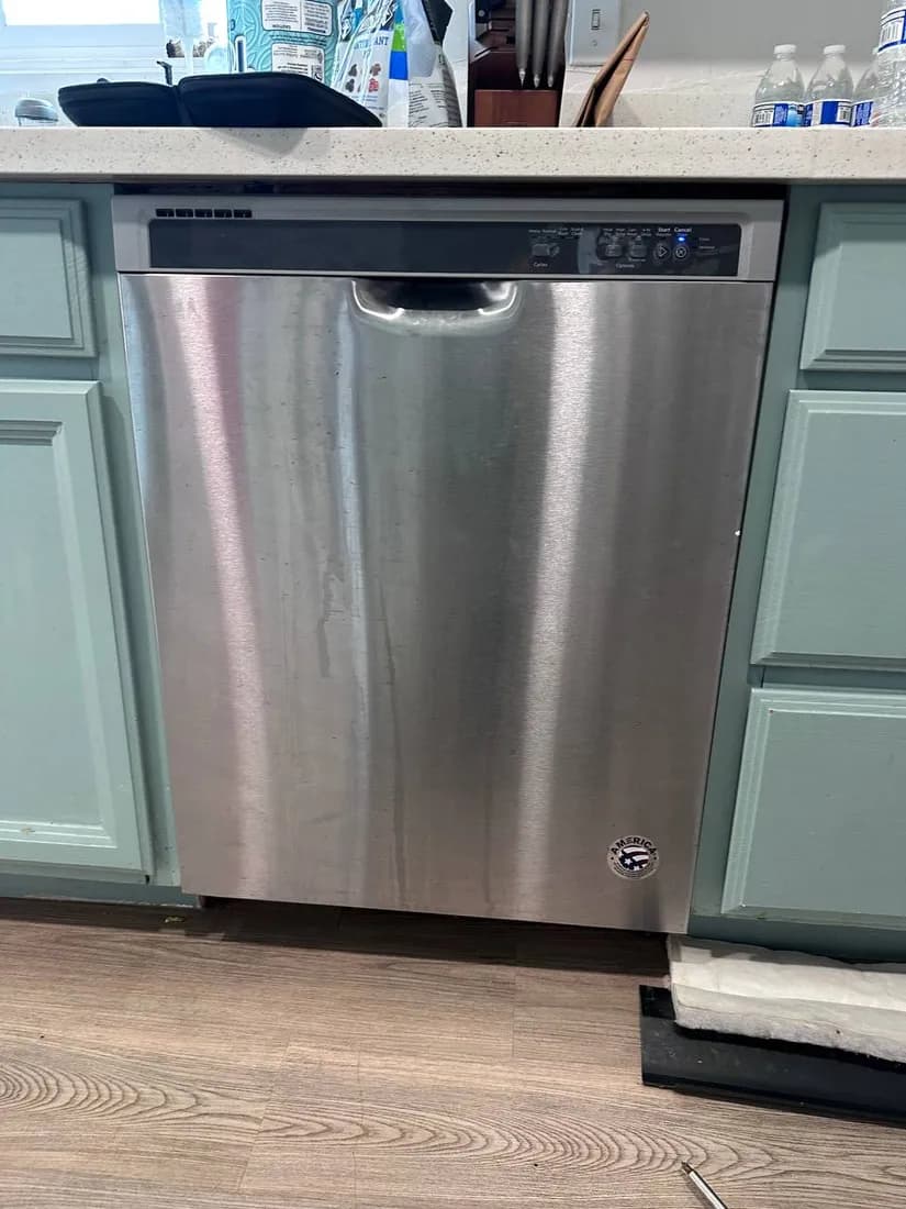Cleaning a dishwasher filter and spray arm — Refrigerator and Appliance Repair, San Diego
